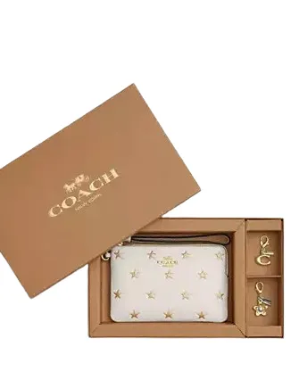 Coach Boxed Corner Zip Wristlet With Star Print And Charms