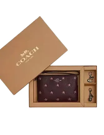 Coach Boxed Corner Zip Wristlet With Star Print And Charms