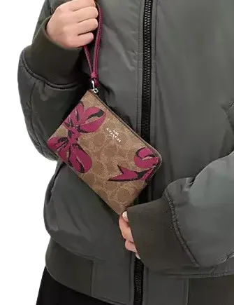 Coach Corner Zip Wristlet In Signature Canvas With Bow Print
