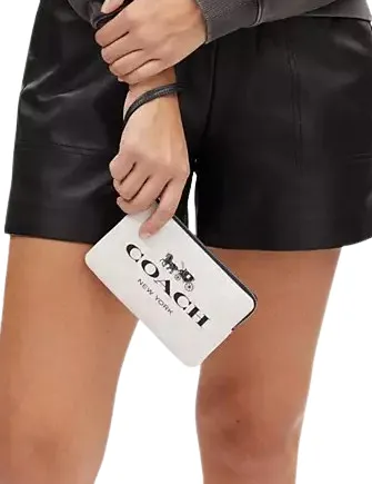 Coach Corner Zip Wristlet In Signature Canvas