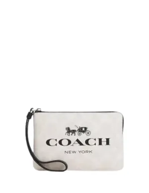 Coach Corner Zip Wristlet In Signature Canvas