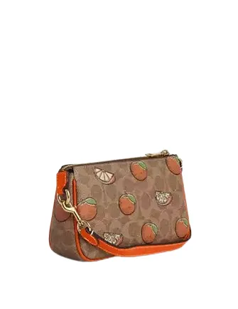 Coach Nolita 19 In Signature Canvas With Orange Print