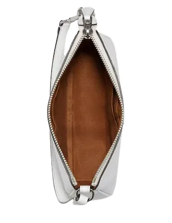 Coach Nolita 19 In Signature Canvas With Train