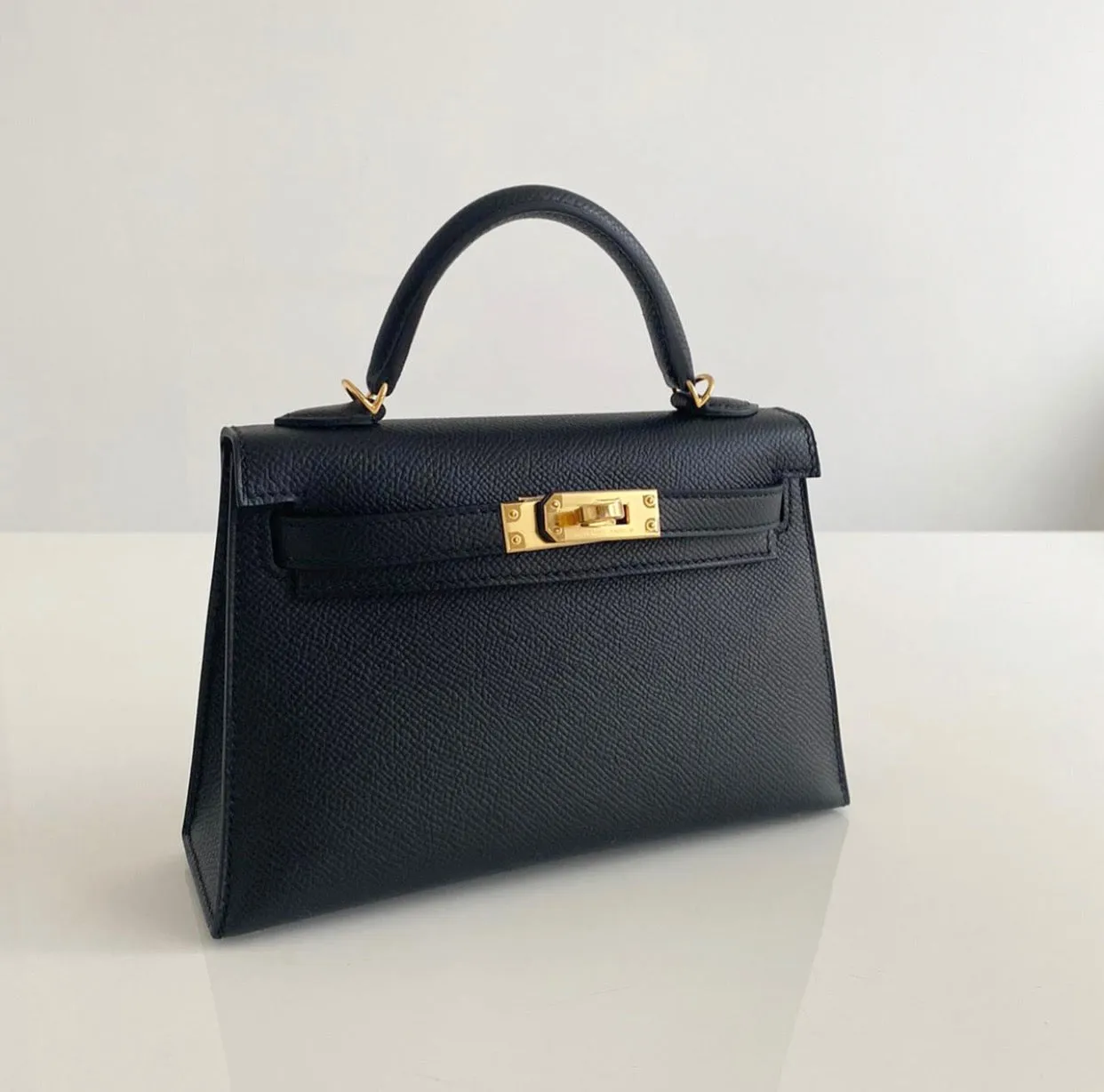 Herm??s Kelly 20 Black Epsom Gold Hardware