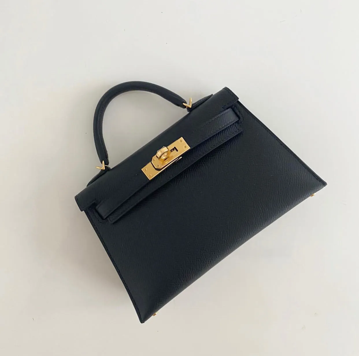 Herm??s Kelly 20 Black Epsom Gold Hardware