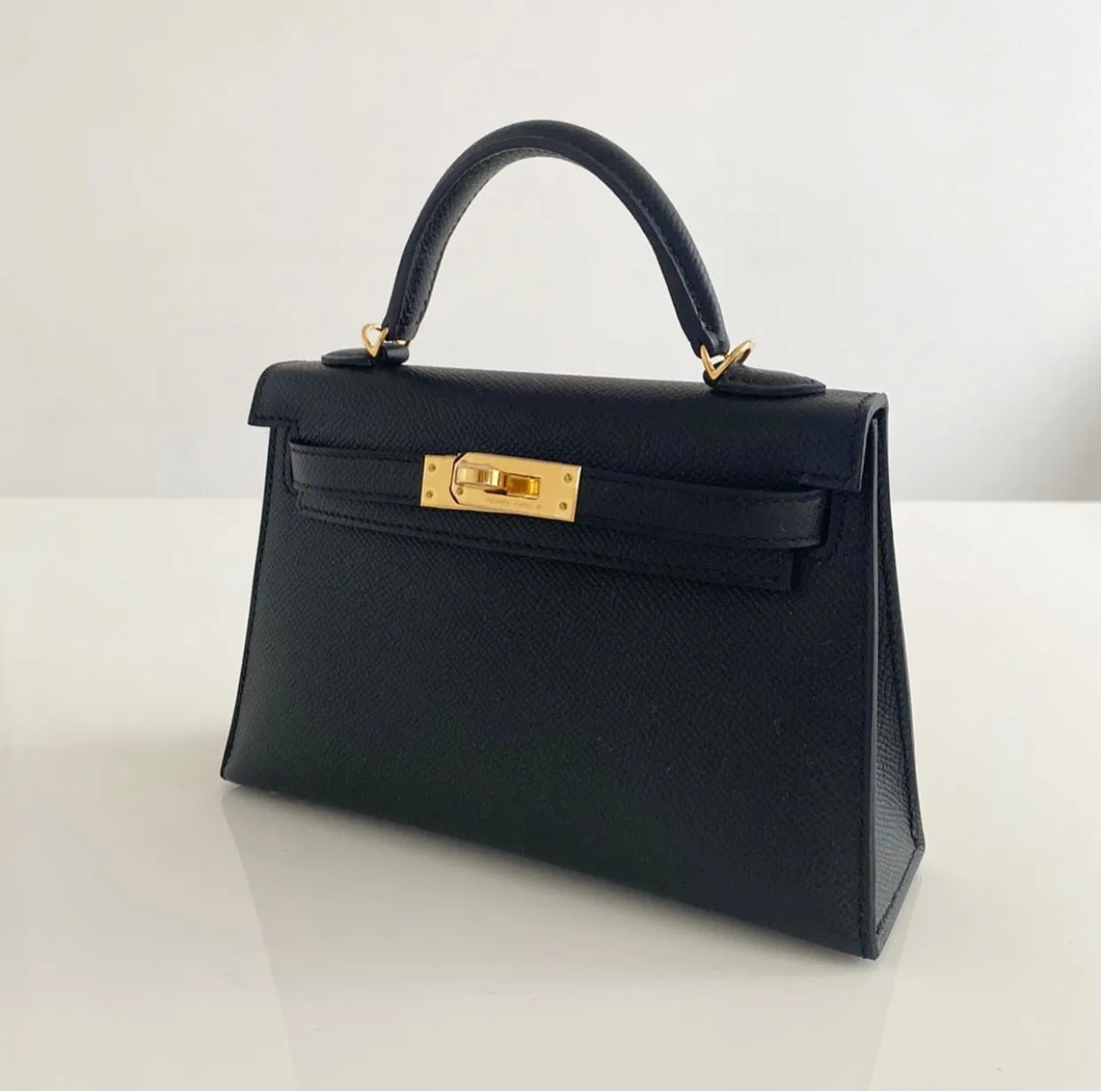 Herm??s Kelly 20 Black Epsom Gold Hardware