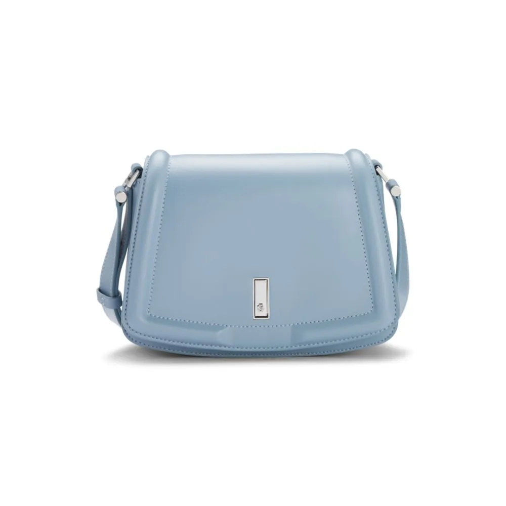 Leather saddle bag with signature hardware and monogram